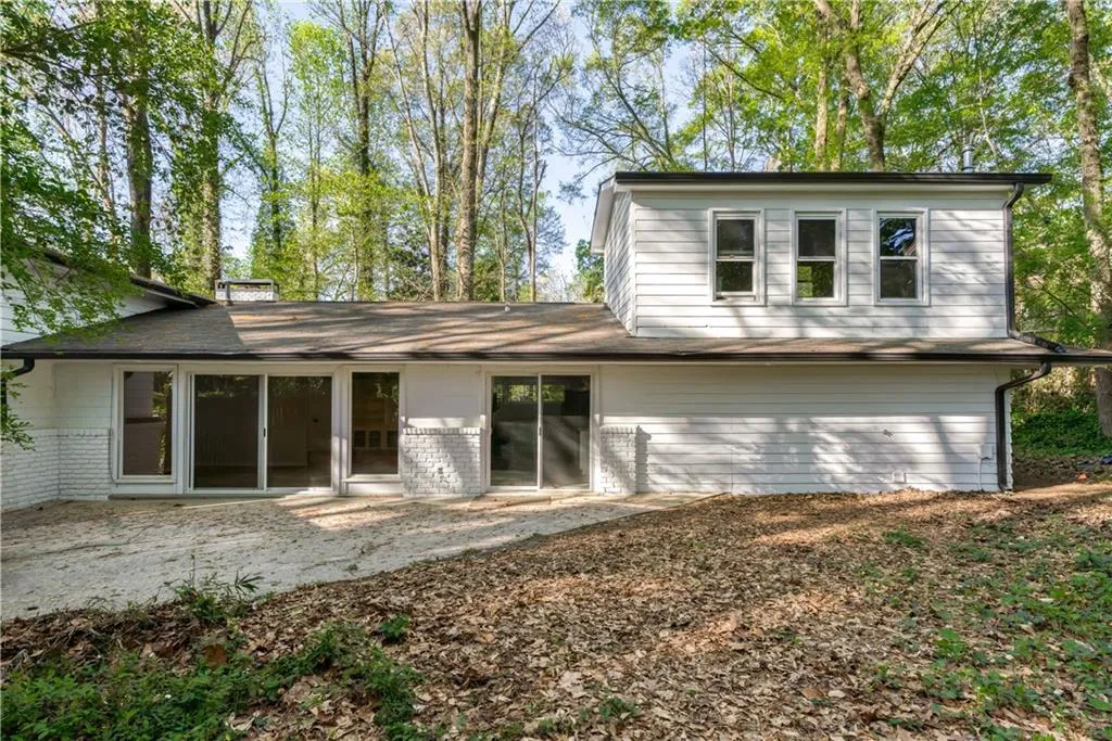 Back of property with a patio area