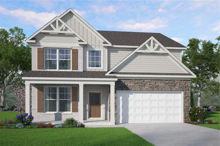 Traditional-style exterior with stone and brick facade, covered front porch, and an attached two-car garage