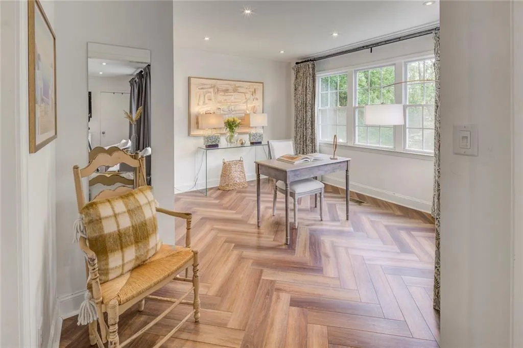 Dining area with light parquet flooring