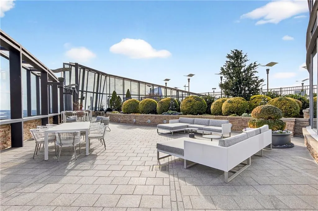 View of patio featuring outdoor dining area and an outdoor living space