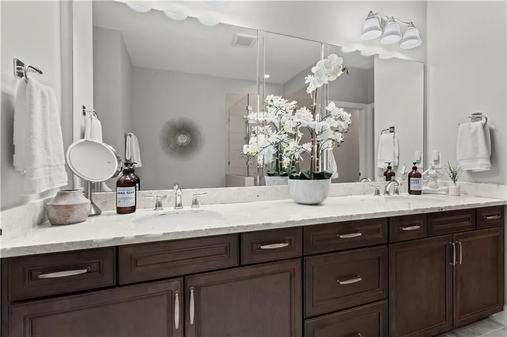 Extensive cabinetry offers a place for everything not to mention the linen closet for towels and additional storage
