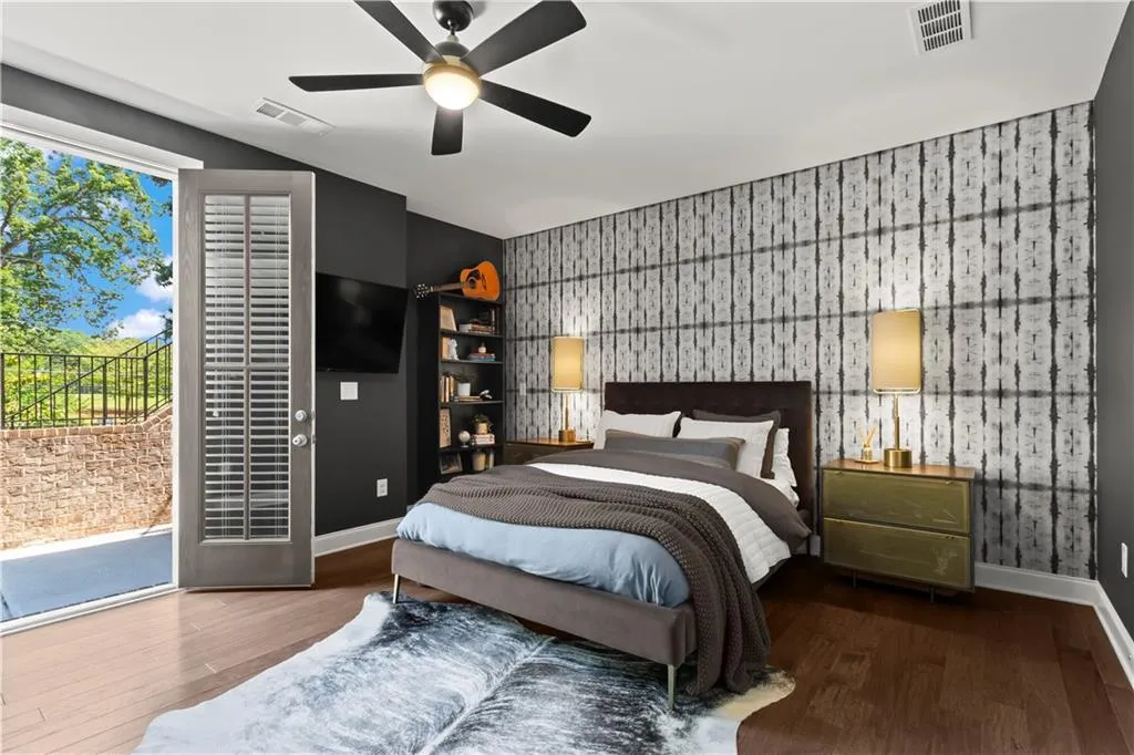 Terrace level bedroom is also a wonderful alternative for an additional living space or home office. Don't miss the Milton & King wallpaper feature wall that brings the space to life.