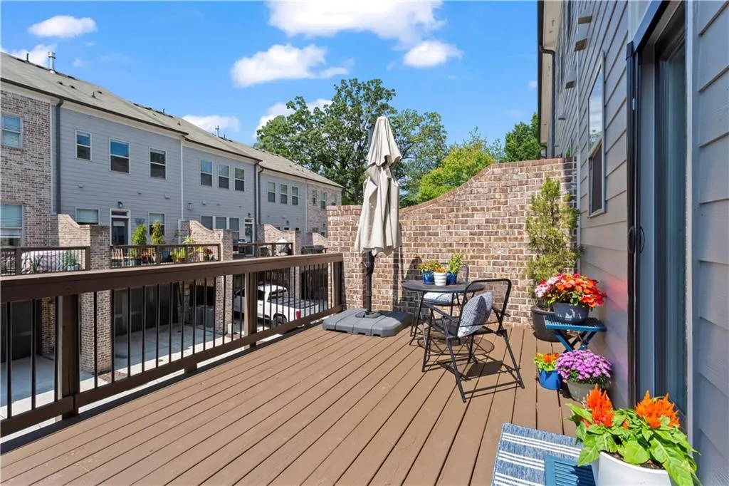 The freshly stained back deck flows directly off the kitchen making your next cookout easy with direct access to everything you need.