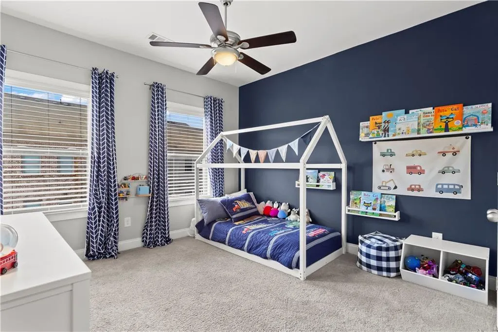 Secondary bedroom situated on back of the house with California closet system and en suite bathroom