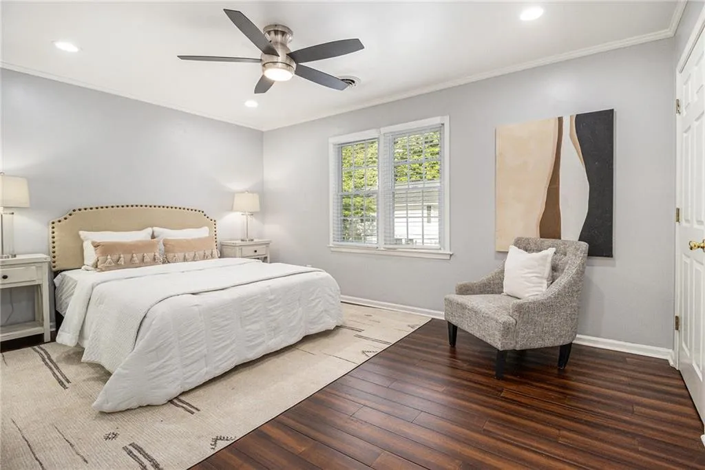 Primary Bedroom featuring His and hers closets