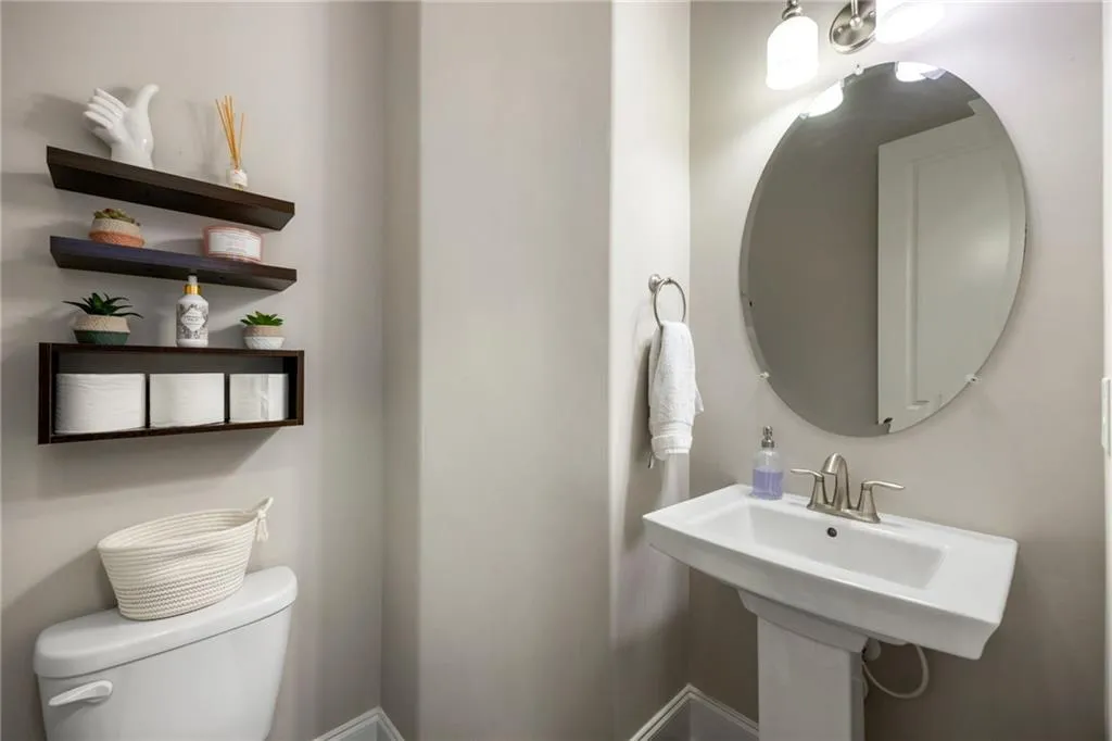 Bathroom featuring toilet and a sink