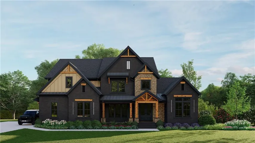 Modern farmhouse exterior featuring dark brick, stone accents, and natural wood trim
