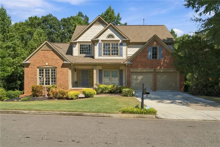 Brick and siding exterior with gabled roof lines