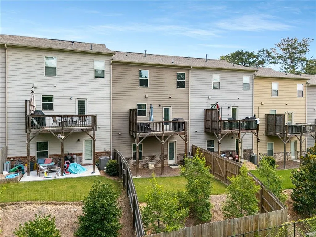 Back of house featuring a patio and a fenced backyard