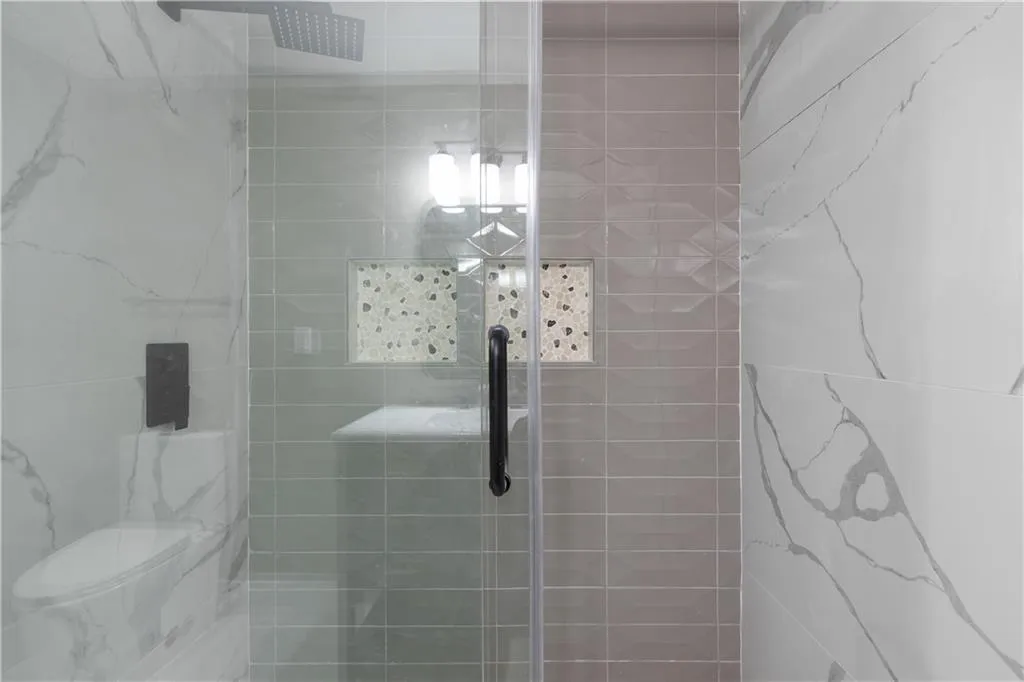 Bathroom featuring a stall shower