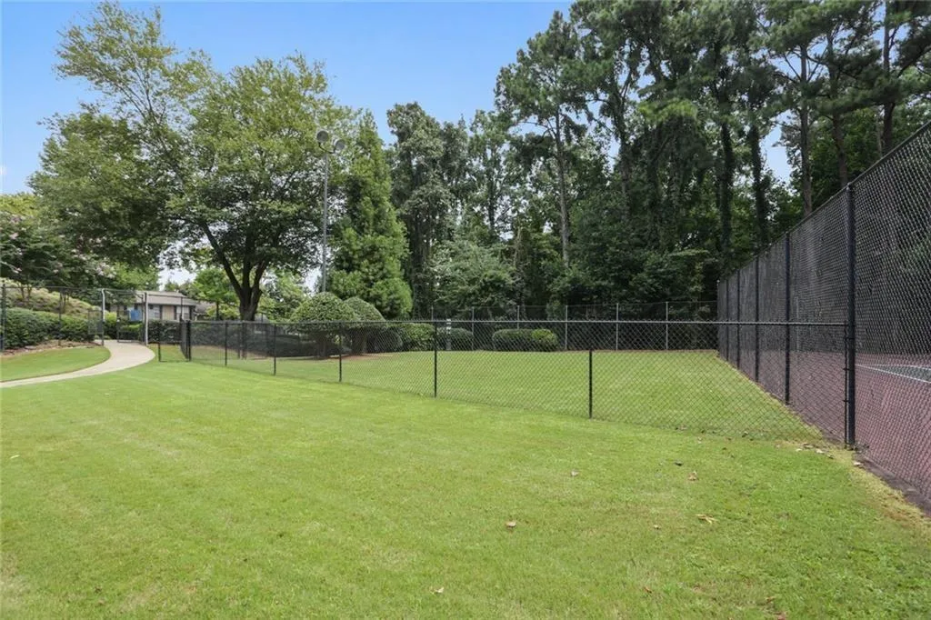 View of property's community with view of wooded area
