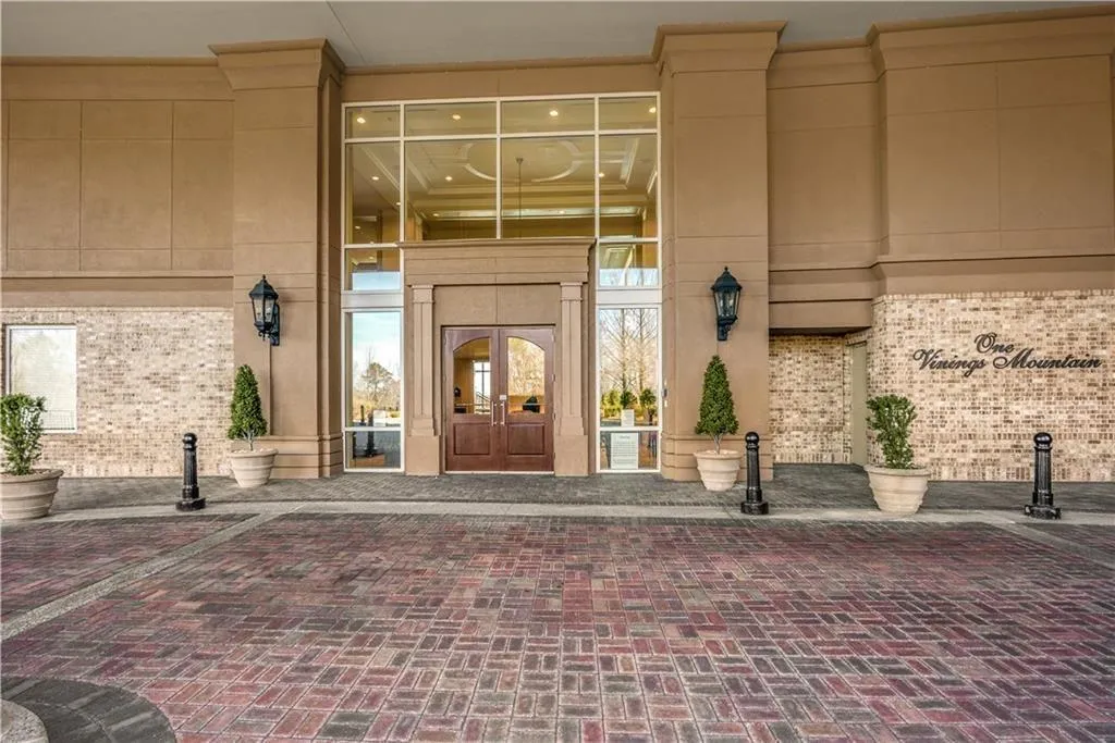 Entrance to property with french doors and brick siding