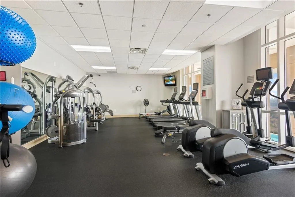 Gym featuring a paneled ceiling