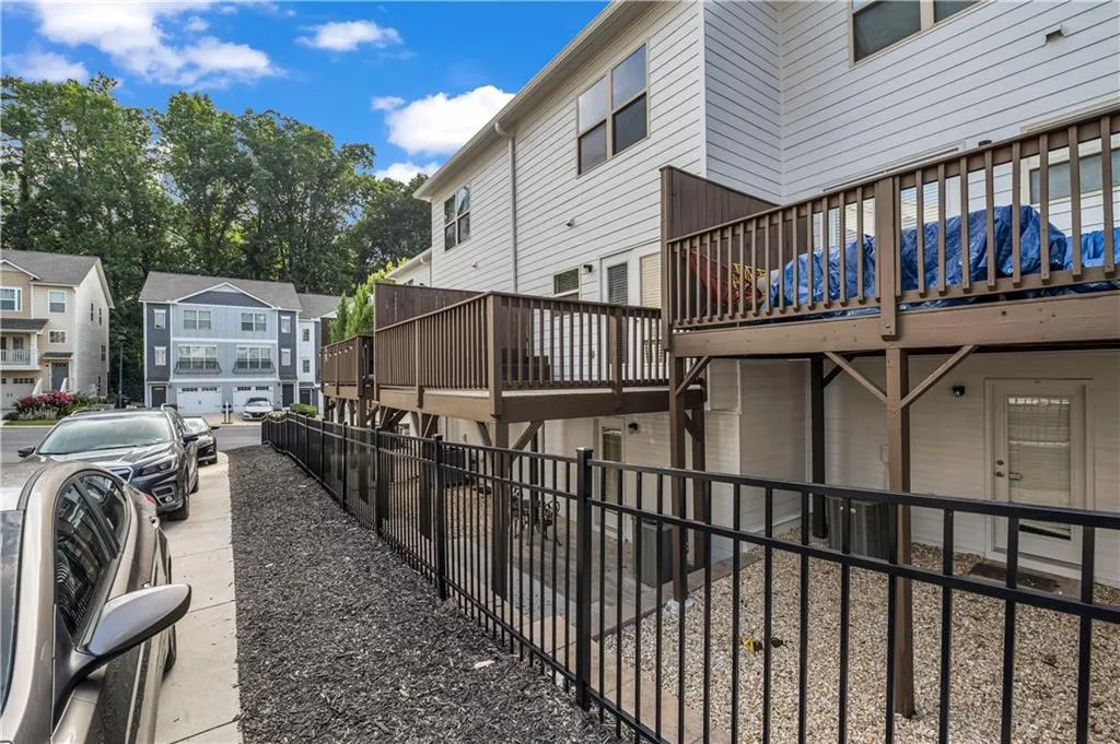 View of property exterior with a residential view