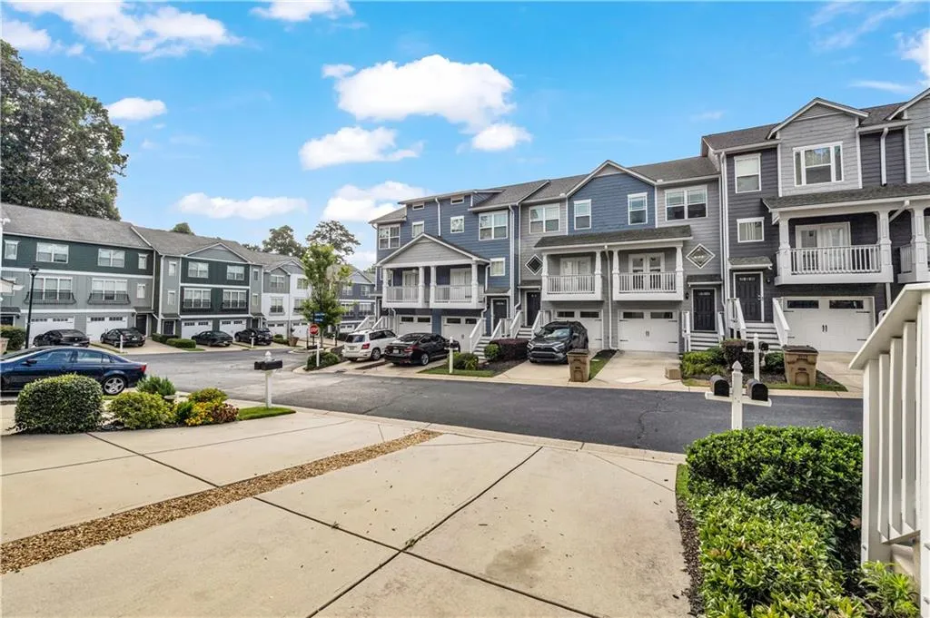 View of asphalt road with a residential view