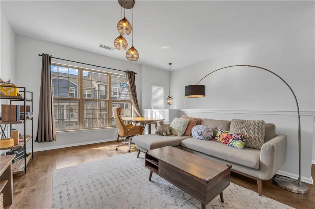Living area with wood finished floors