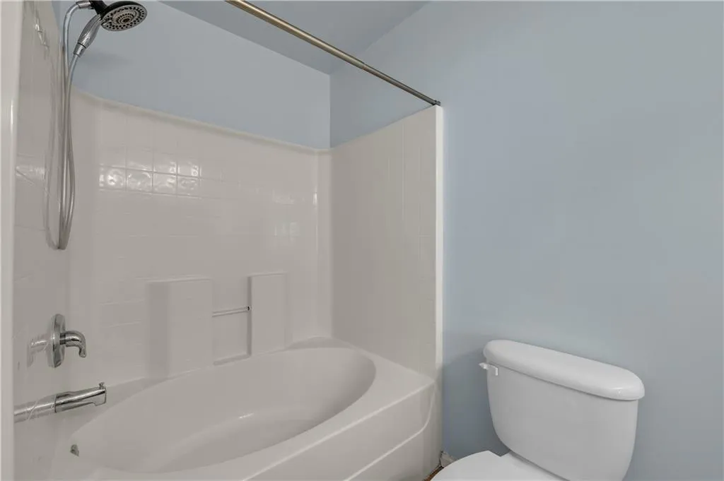 Bathroom with shower / tub combination
