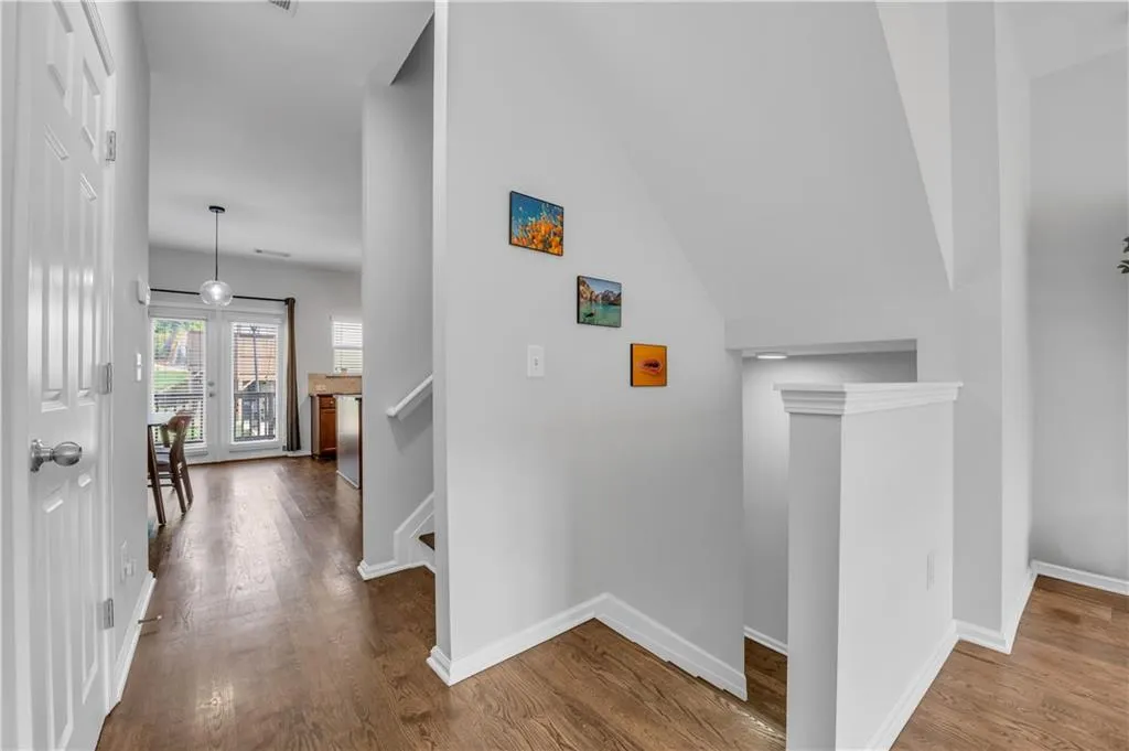 Corridor with wood finished floors