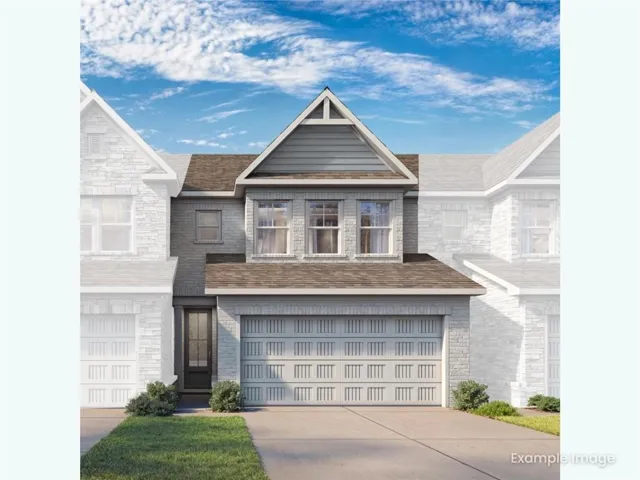 Two-story facade featuring light brick and horizontal siding accents