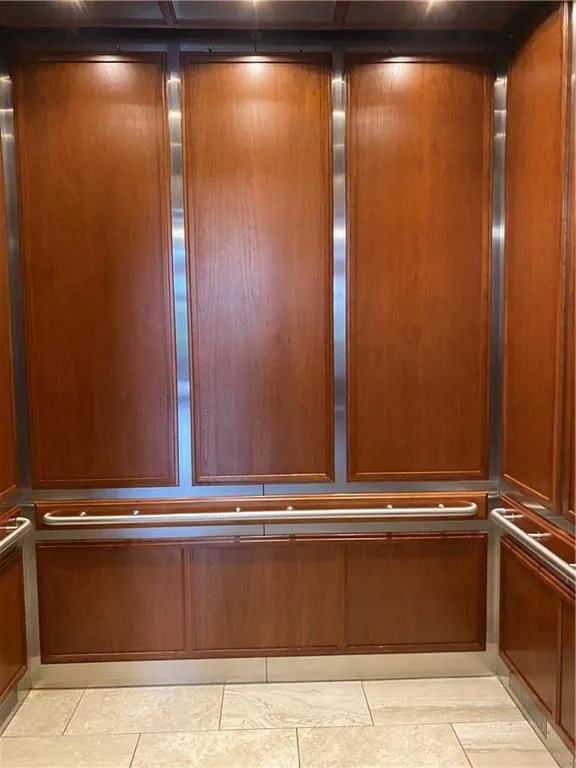 Wood-paneled interior with brushed metal accents
