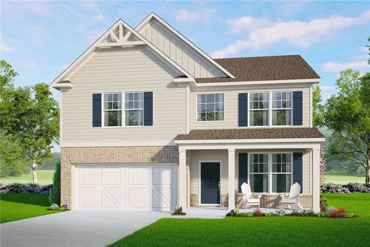 Two-story residence featuring light-colored siding, a covered entry porch, and a two-car garage