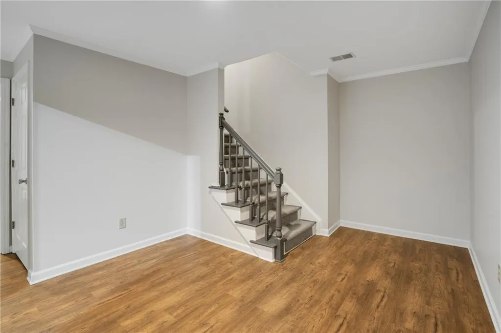 Brand new LVP flooring, new paint, a refreshed full bath. A nice balance of finished and unfinished space awaits.