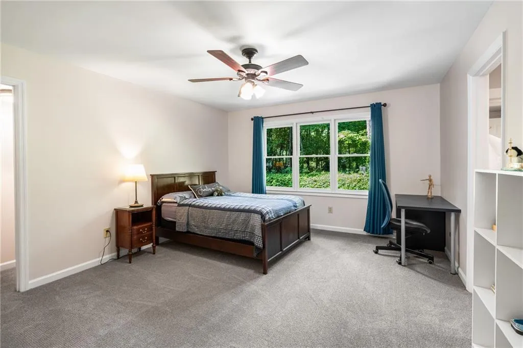 900 Edgewater Drive~ Another large Secondary Bedroom which is connected to the Jack and Jill bathroom.This bedroom also features nice sized walk in closets.