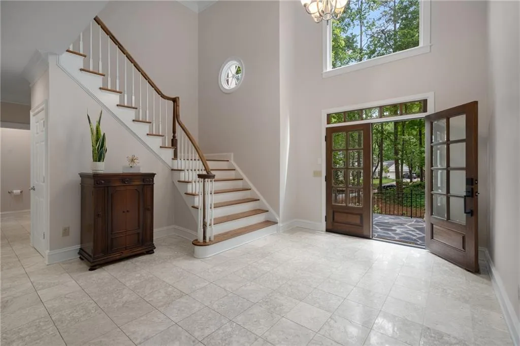 900 Edgewater Drive~ An alternate view of the soaring heights of the two story Foyer.