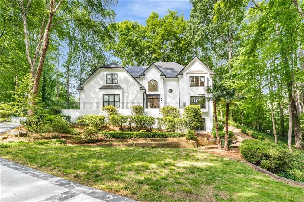 900 Edgewater Drive~ A rare turnkey find in the Heards Ferry and Riverwood Districts!