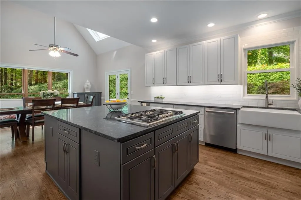 900 Edgewater Drive~ This Kitchen Steals the show. Renovated with stainless appliances, double ovens and an oversized island plus an apron sink and oodles of cabinetry, cooking will be a dream.