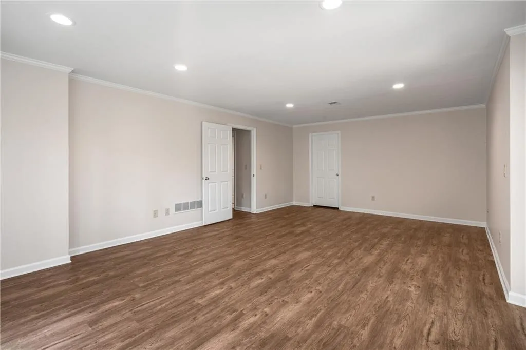 900 Edgewater Drive~ Ideal for guests, teens, or in-laws. With full size windows, updated finishes, and amazing flex spaces for hobbies or creative work, this Terrace Level has it all.