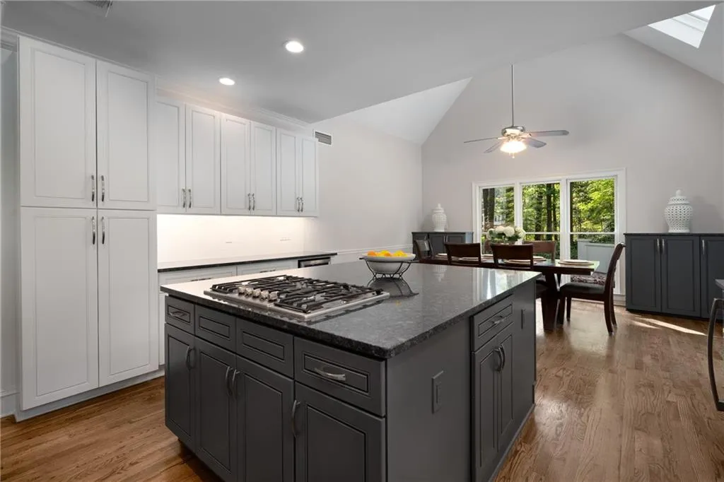 900 Edgewater Drive~ Cabinets galore, tons of light, subway backsplash, even a beverage fridge- this kitchen truly has it all!