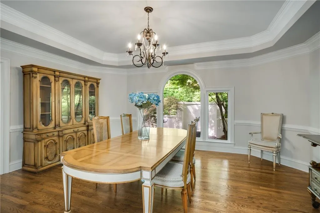 Another view of the Dining Room which connects to the Kitchen. The spacious dining room has a gorgeous tray ceiling.