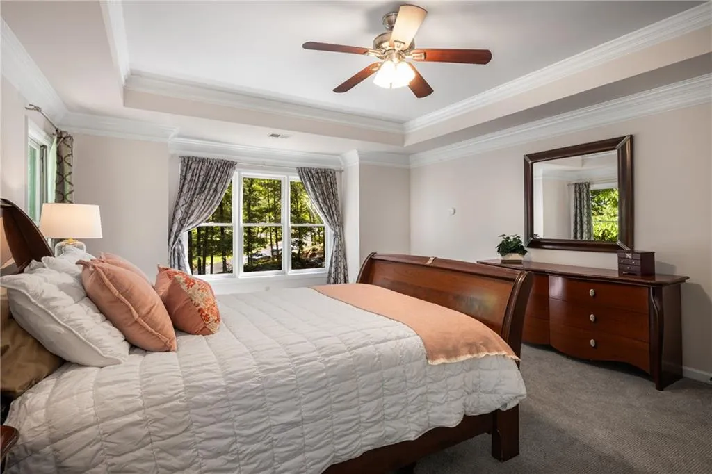 900 Edgewater Drive~ Trey ceiling, fresh carpet, walk-in closet, tons of light, private balcony, renovated bathroom- your retreat awaits.