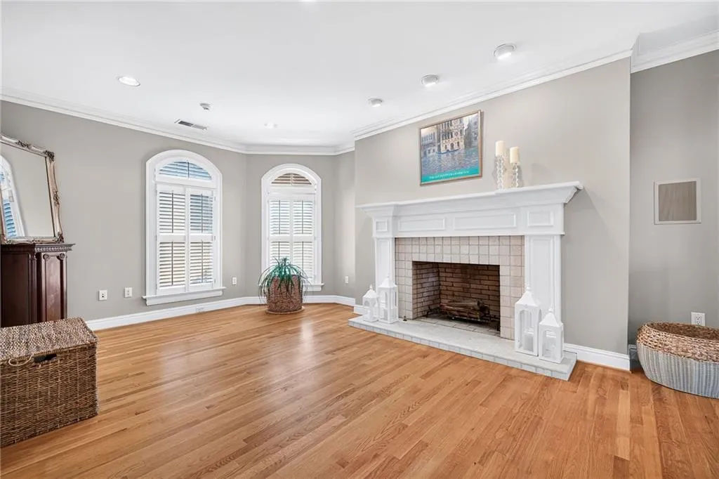 Master bedroom has one of three fireplaces; large enough to accommodate living room seating