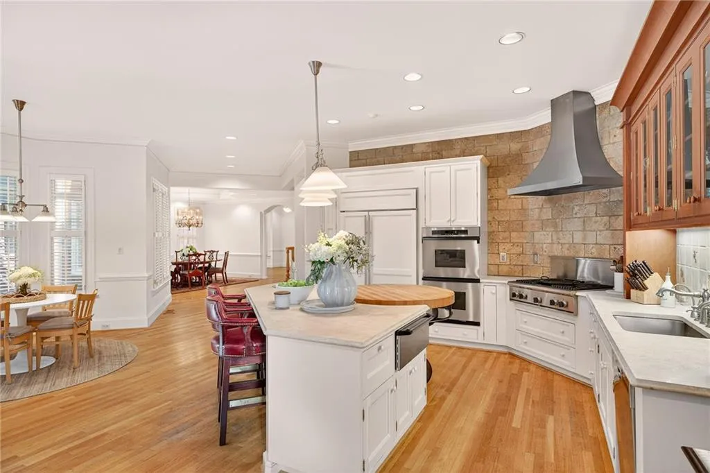 Subzero refrigerator, Thermador gas range, double ovens, warming drawer and more