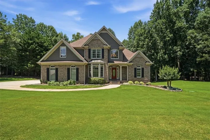 Brick and siding exterior with gabled roof lines
