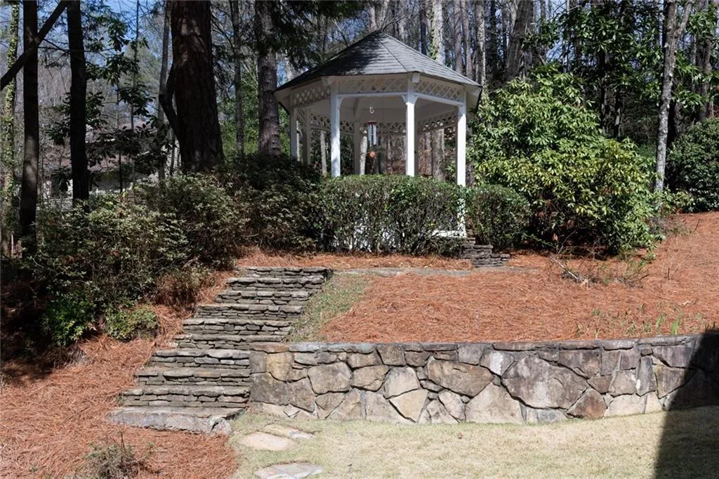 Private gazebo overlooking the pool area.