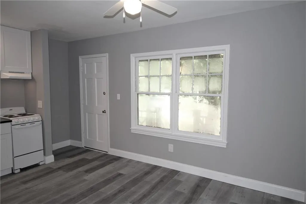 Unit 3 living/ dining/ kitchen combo has LVP flooring. Totally renovated about 4 years ago.  Still has original tenant!
