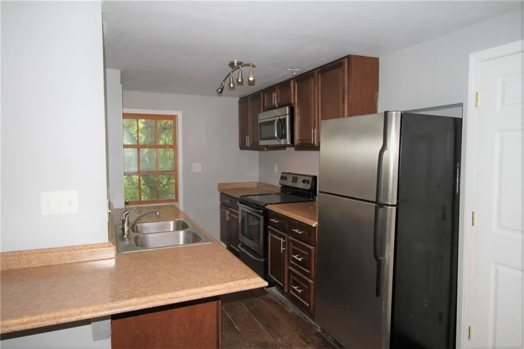 Entry to the unit is next to the window