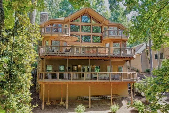 Multi-level exterior with extensive decking and multiple balconies