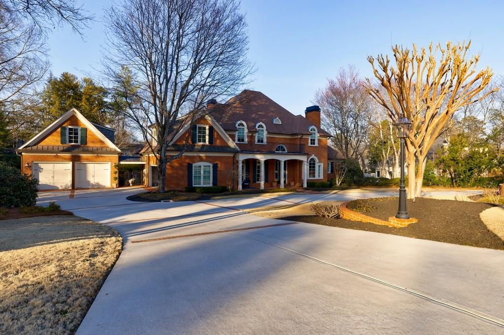 View of front facade featuring garage