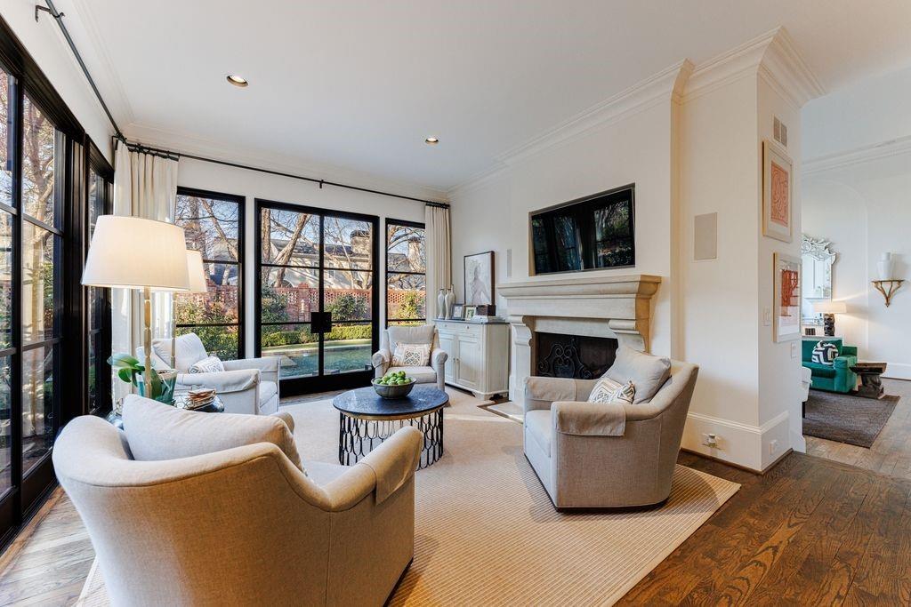 Gorgeous keeping room off kitchen with custom Francois and Co fireplace mantel