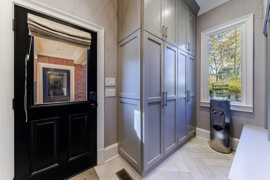 Mud/Laundry room with custom cabinets and cubbies