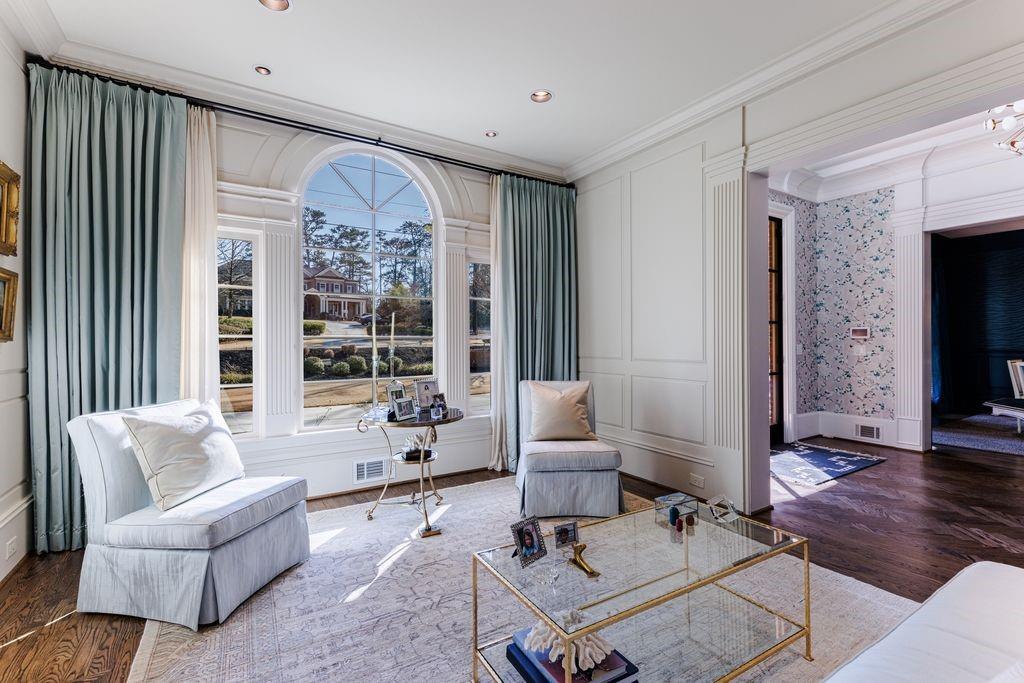 Gorgeous, light filled living room with fireplace