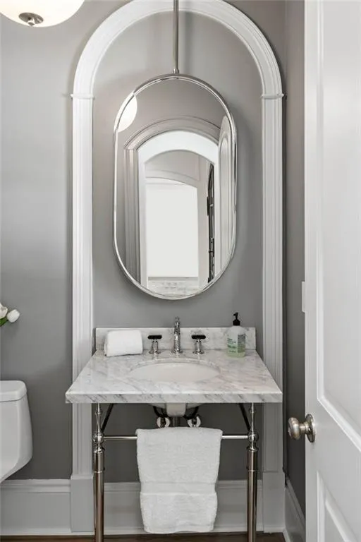 Bathroom with sink and toilet