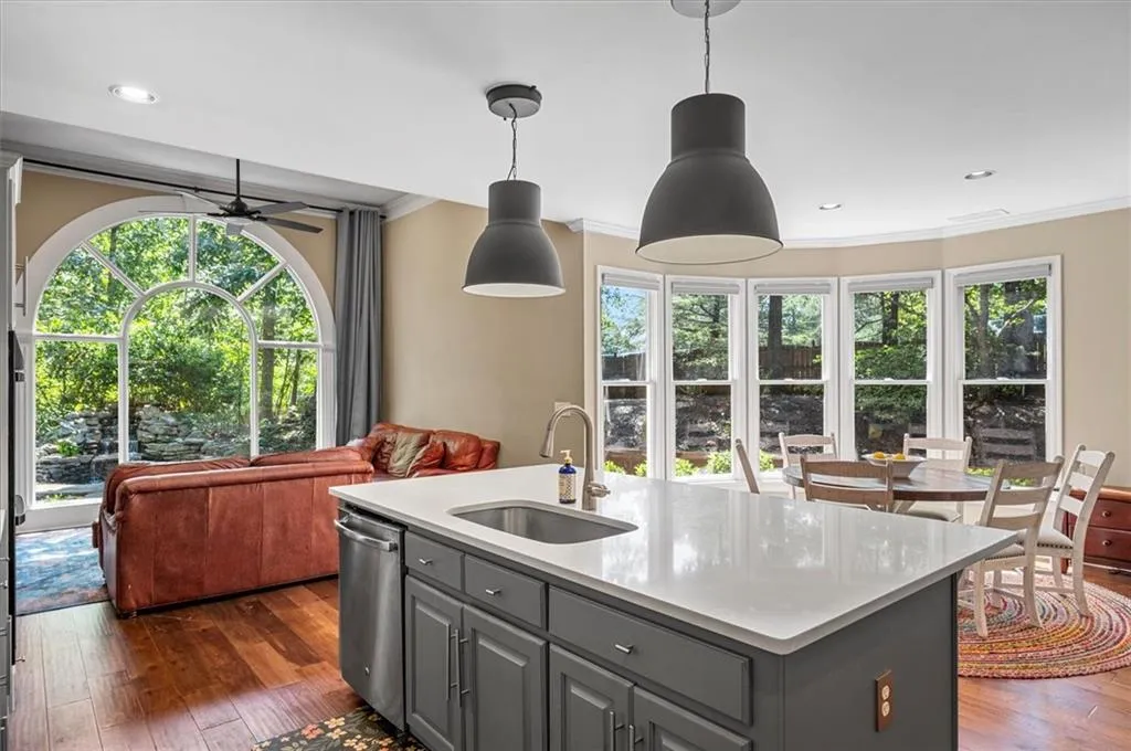 Eat In & Keeping Room!  Look at this peaceful scene of outdoor waterfall through picture window!