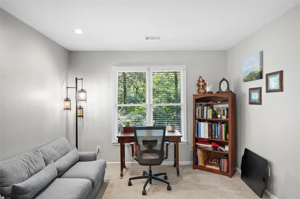 Office or Sitting Area in Primary Suite with views to Backyard!