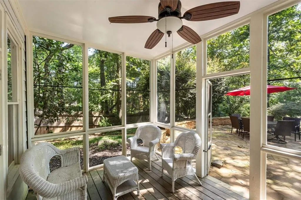 Covered screened porch with views to your private oasis!