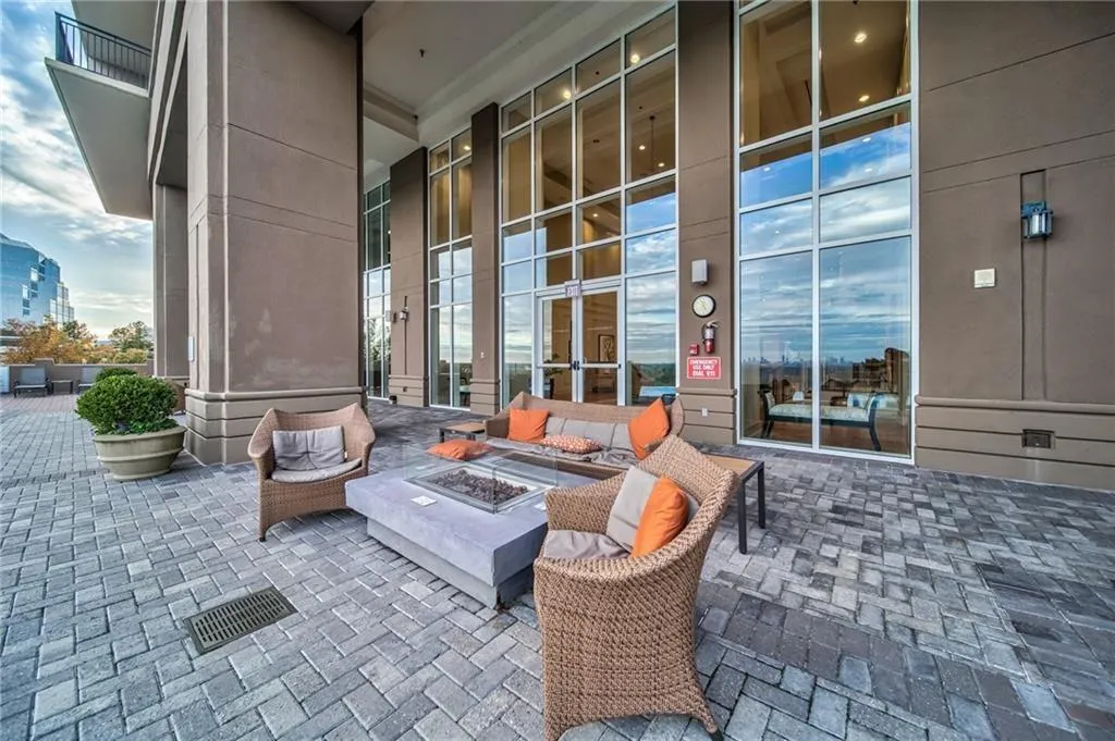 View of patio / terrace featuring an outdoor fire pit